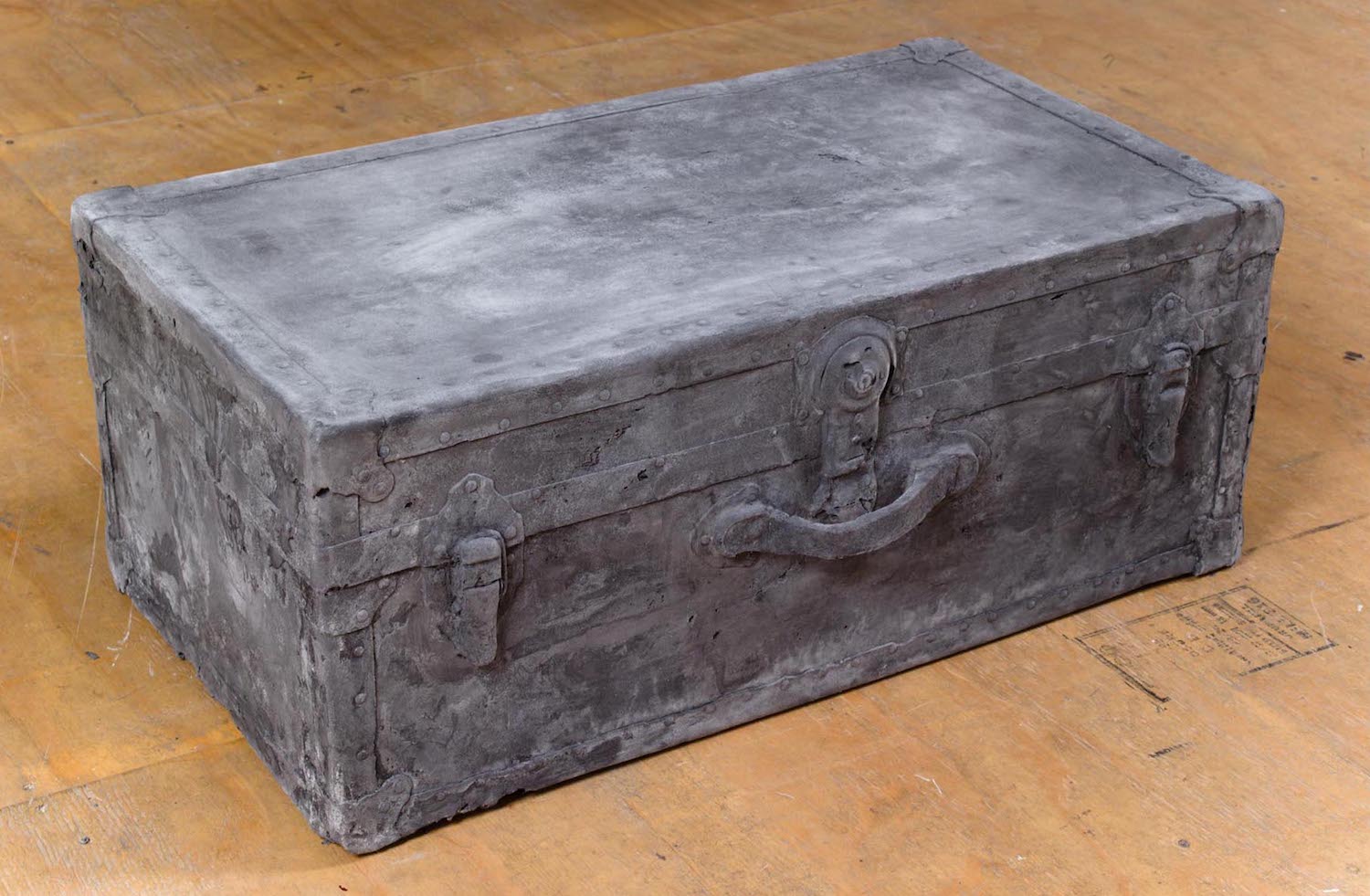 John Jurayj*, Untitled (Luggage in Multiple Parts)*, 2011. Cast gunpowder and plaster